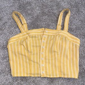 yellow button up top
